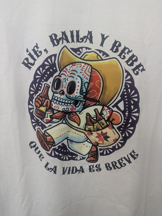 Amazon Tops - White Graphic Tee with Festive Skull Cowboy Print